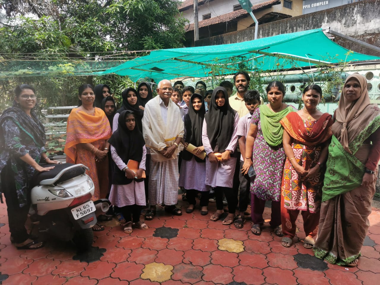 Abu Haji with school children Abu Haji with school children