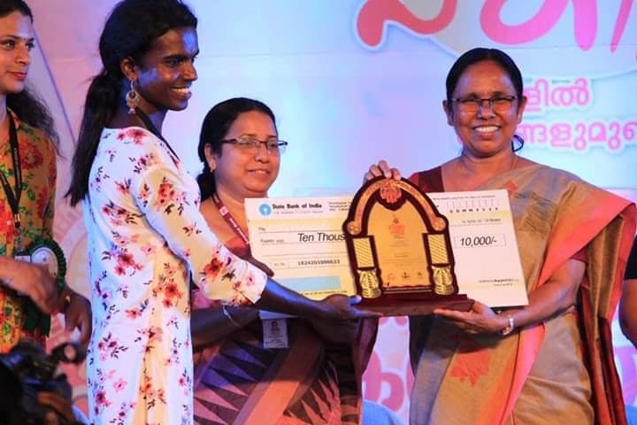 Sreya receives an award at the state transgender arts festival from Minister KK Shailaja Sreya receives an award at the state transgender arts festival from Minister KK Shailaja