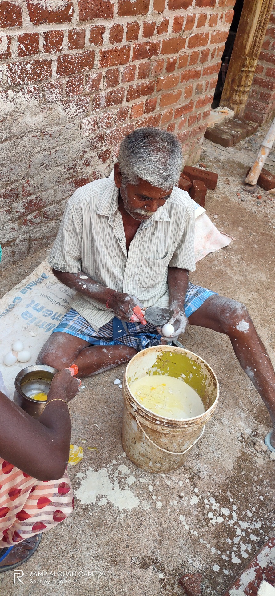 Egg white being separated to be used in the construction process