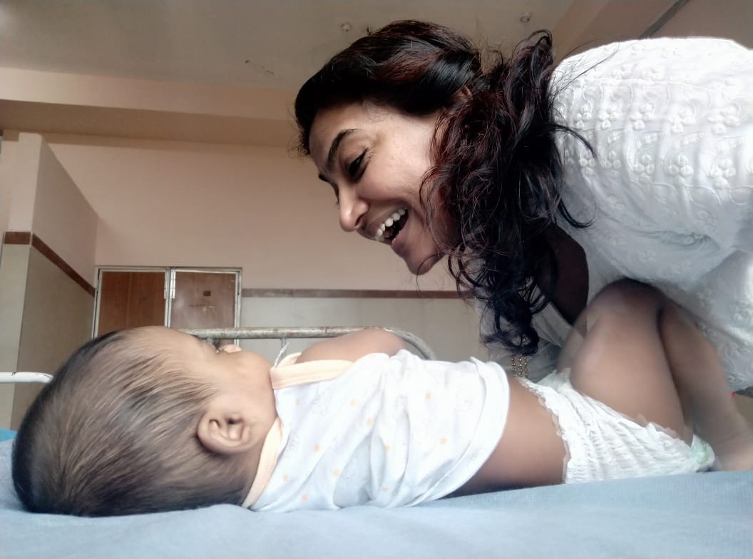 Dr Mary Anitha volunteered to look after the 6-month-old Unni whose parents were tested positive for Covid-19 Dr Mary Anitha with Unni